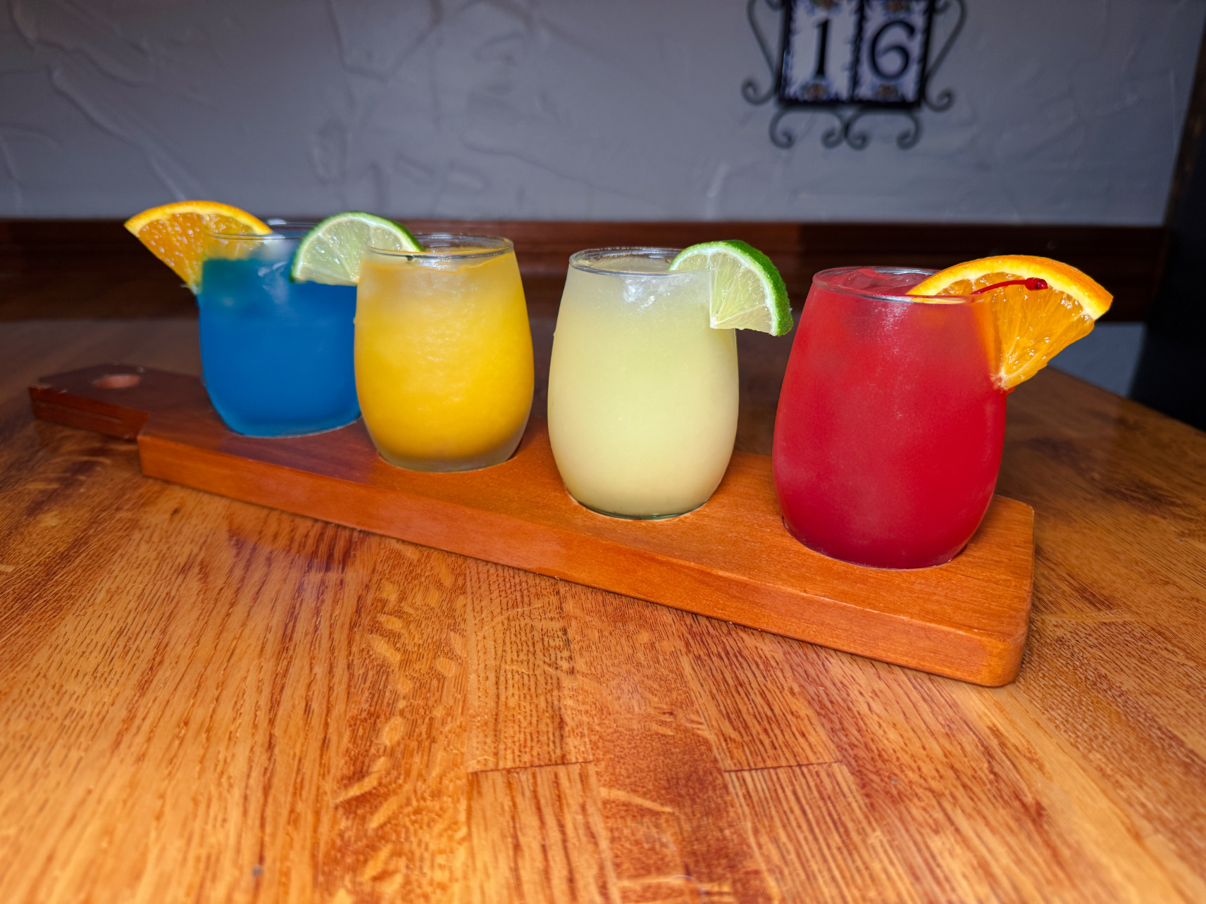 Refreshing margarita with orange garnish